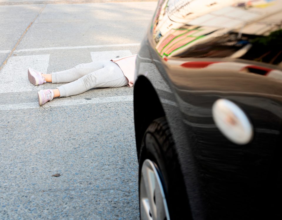 Unfallsituation mit Kind vor Auto